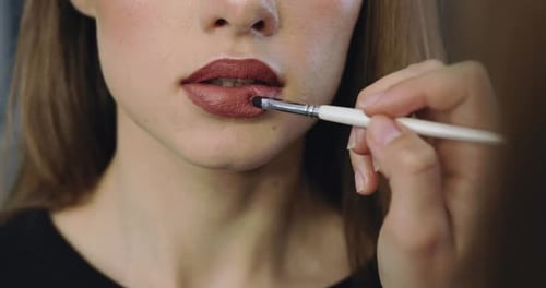 Closeup of Girl Lips with Perfect Nude Make Up
