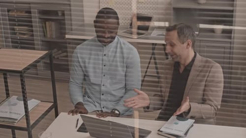 Business Team Discussing Strategy in Modern Office