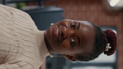 Vertical Video Portrait of Smiling African American Software Developer Looking at Camera