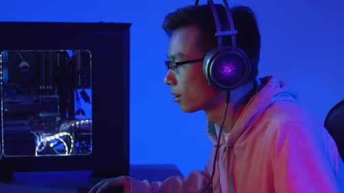 Young Adult Using Computer Mouse with Green Screen