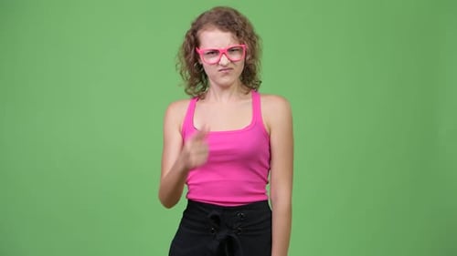 Young Woman Gesturing Dismissively on Green Screen