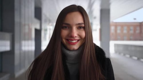 Pretty Smiling Happy Woman with Beautiful Smile on City Street