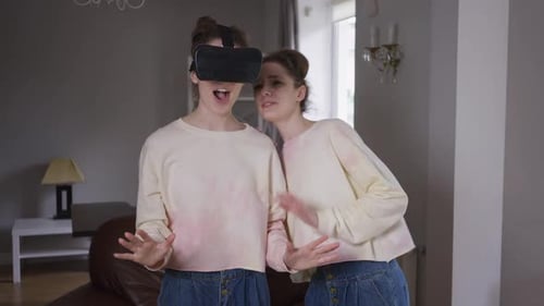 Women Experiencing Virtual Reality Together in Home