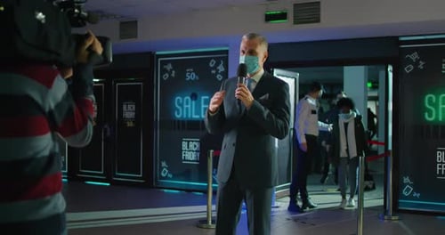 Reporter Reports on Black Friday Sales Event