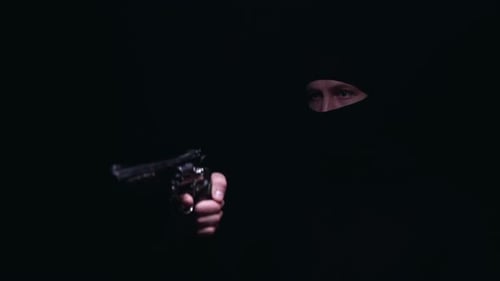 Man in Ski Mask Aims Gun in Dark