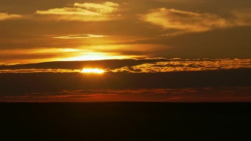 Sunrise over the Horizon in Time Lapse