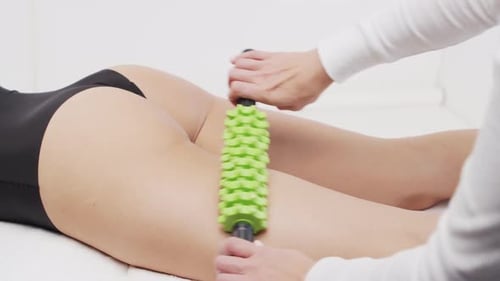 Leg Massage with Green Roller for Body Care
