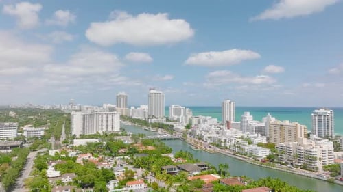 Aerial Ascending Shot of Luxurious Residential Borough and Vacation Complex on Sea Coast