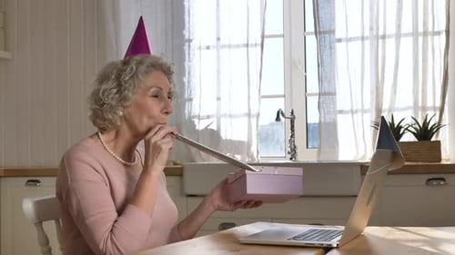 Cheerful Woman Celebrates Birthday on Video Call