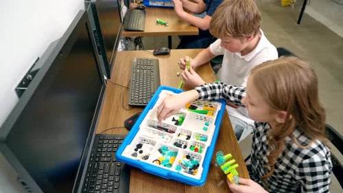 Kids Making Robot Using Building Kit.