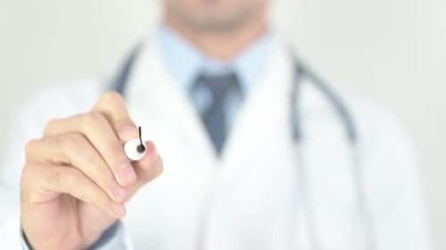 Doctor Writing Wellness on Glass, Close Up Shot