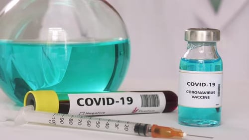 Scientist in the laboratory tests the vaccine against the Coronavirus Covid-19