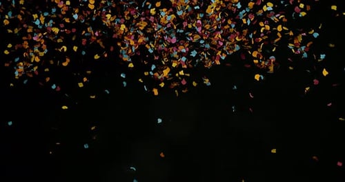 Colorful Confetti Falling on Dark Background