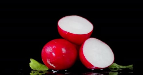 Whole and Sliced Radishes with Leaves Rotates Slowly