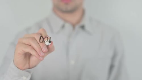 Writing 'Don't Miss Out' Close Up on Glass