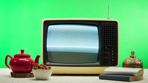 Retro Television Displaying White Noise on Green Screen