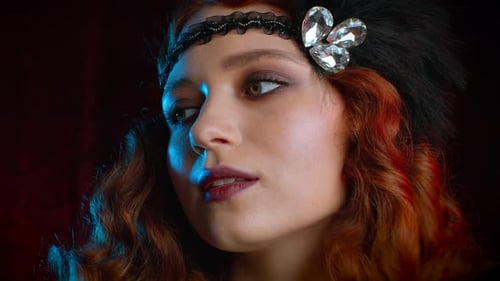 Portrait of Vintage Styled Red Haired Woman Dressed in Great Gatsby Era Flirting