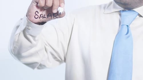 Professional Writes Salary on Glass Surface