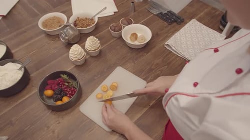 Cook Cutting Fruit