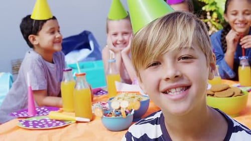 Smiling Children Celebrate at Birthday Party