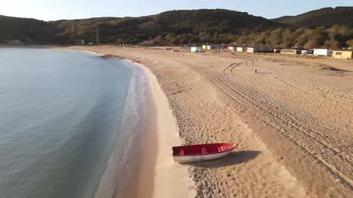 Boat on Empty Beach Due To Coronavirus