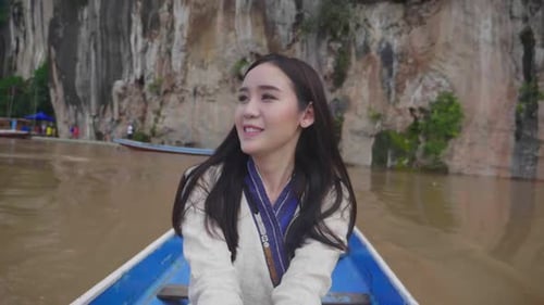 Woman Smiling on Tropical River Boat Ride