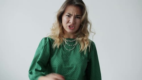Furious Young Woman Ranting and Gesturing