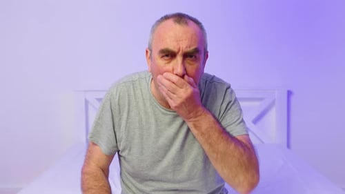 Portrait of Old Caucasian Man Getting Cold and Coughing at Home