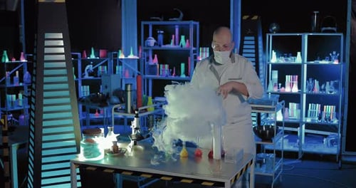Scientist Performing Experiment with Smoke in Futuristic Lab