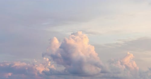 Cumulus Clouds Lit by the Setting Sun