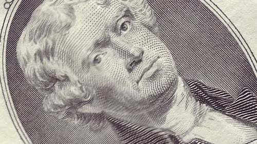 2 USD close-up motion. Two cash american dollars macro view background