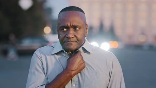 Man in Distress Grasping at His Throat