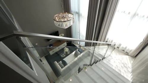 Modern Home Interior with Crystal Chandelier and Daylight