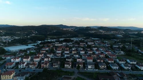 Aerial View of Residential Houses in Suburban Rural Area at Sunset