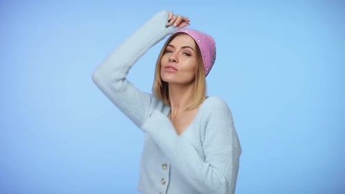Stylish Woman Posing in Studio Setting