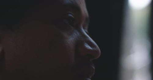 Young man listening and talking close up of eyes