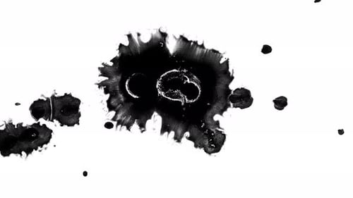 Black Ink Spreading on a White Background