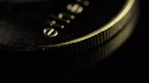Rotating shot of Bitcoins (digital cryptocurrency) - BITCOIN ETHEREUM