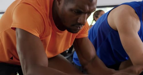 Working out on exercise bikes at a gym