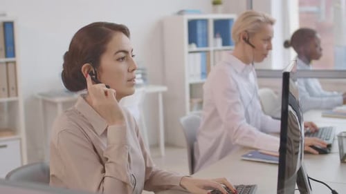 Diverse Hotline Receptionists at Work