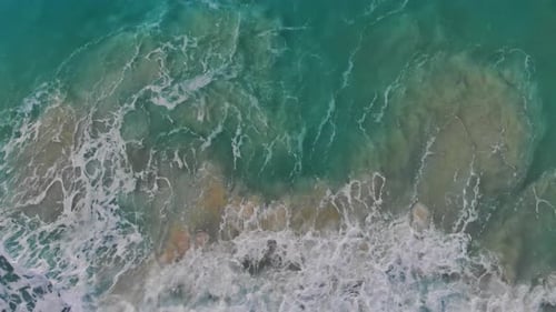 Summer Seascape From Air Coast with Waves As a Blue Water Background