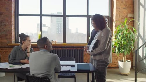 Professionals Meeting in Urban Workplace