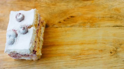 Close-Up of Blueberry Cake on Wooden Surface