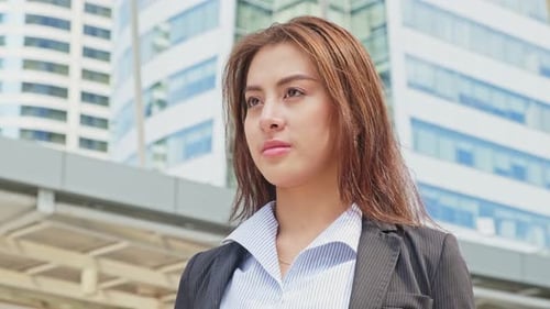 Portrait of Asian young beautiful smart business woman working in company office, walking in city.