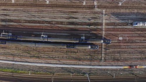 Aerial view. Modern high speed train. Railroad in landscape, aerial view from above.