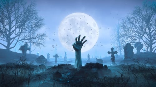 Spooky Zombie Hand Rising from Grave in Misty Halloween Cemetery
