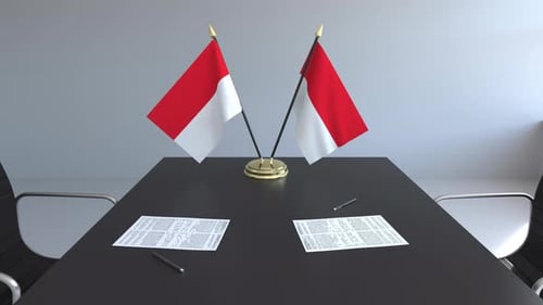 Corporate Conference Table with Red and White Flags