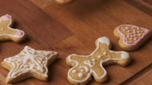 Decorated Gingerbread Cookies on a Wooden Surface