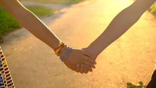 Children Walk Hand in Hand