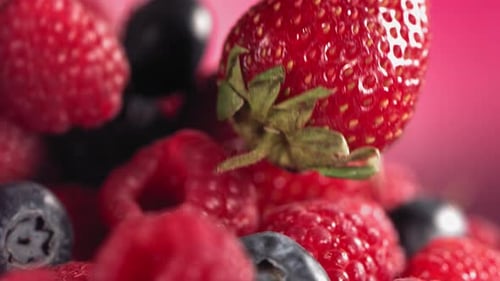 Delicious Berries Falling in Slow Motion